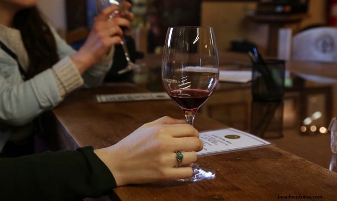 A glass of red wine in hand is always great